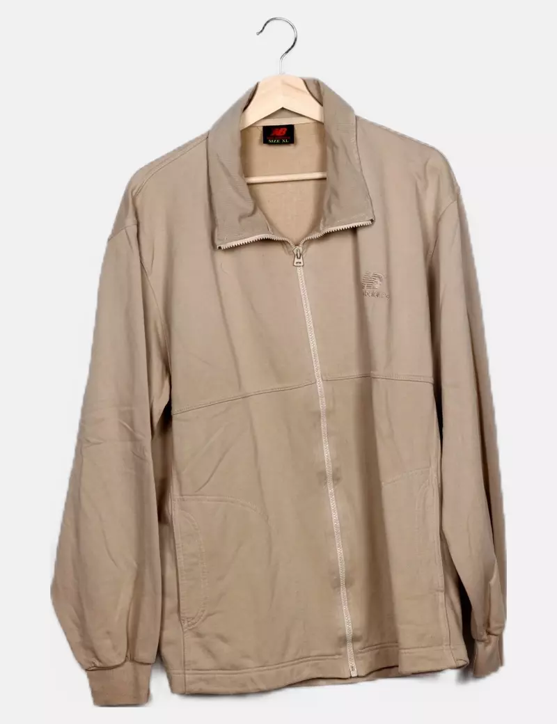 Beige zip-up jacket from New Balance